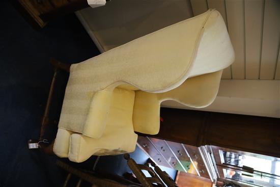 A George II mahogany wing armchair, W.2ft 3in. D.2ft 6in. H.3ft 11in.